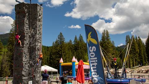 Trampoline and Climbing wall in Solitude's Adventure Park
