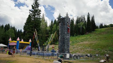 Bungee Trampoline, climbing wall and bounce house at Solitude Adventure Park