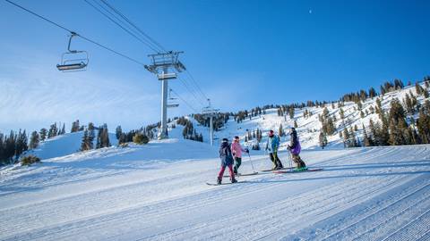 Friends hanging out under Moonbeam Lift