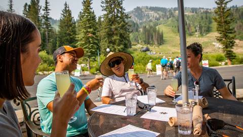 A group of friends enjoy drinks at Honeycomb Grill at Solitude Mountain Resort. 