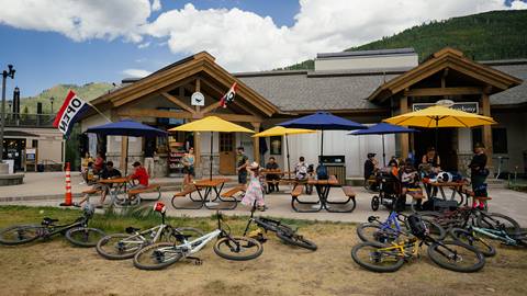 Mountain bikers enjoying food and drinks at Little Dollie's while riding Solitude Bike Park