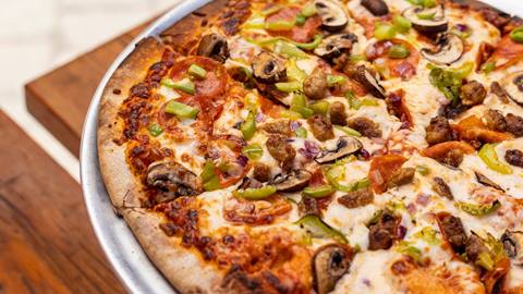 A close up of a pizza from Stone Haus at Solitude Mountain Resort