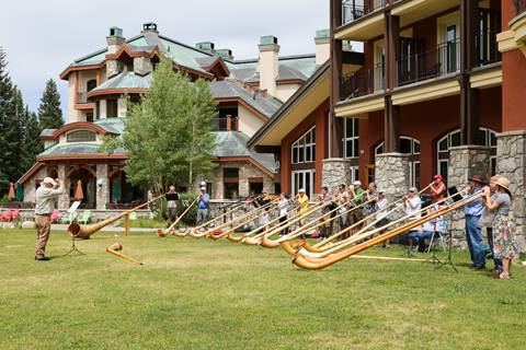 outdoor alphorn concert on the inn lawn