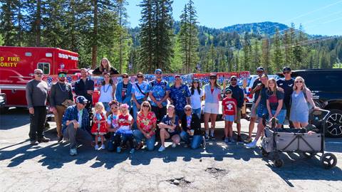Solitude employees participate in the 4th of July parade in the town of brighton