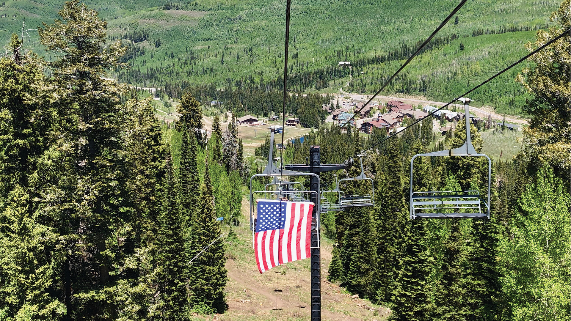 United States flag hanging from a chair on Sunrise Lift