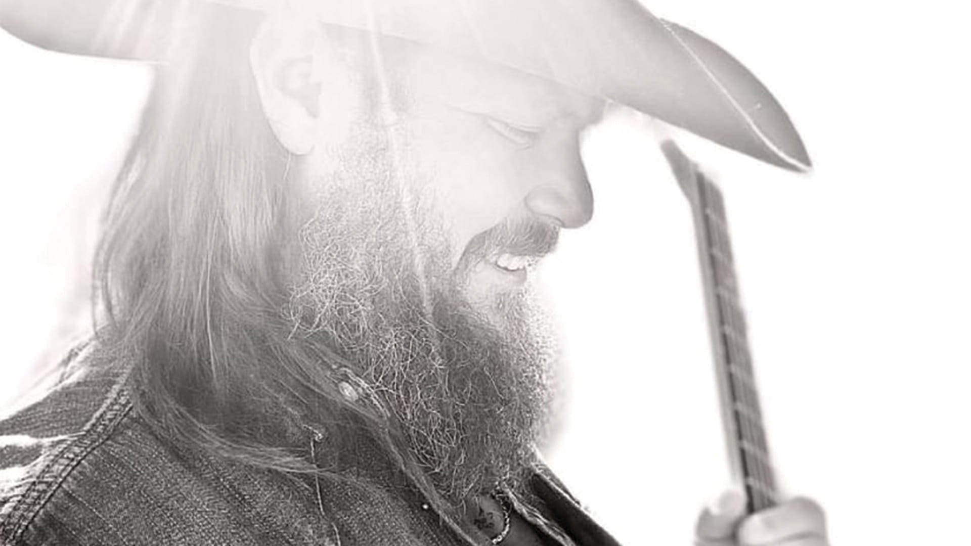 Paul Clecker playing the guitar