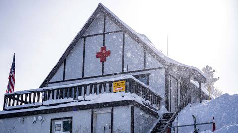 Snow falls on the Powderhorn Ski Patrol Shack at Solitude Mountain Resort