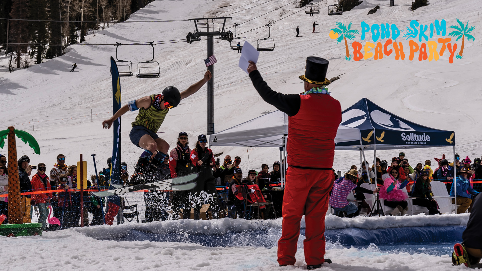Skier doing a 180 out of the pond after a successful pond skim at Solitude