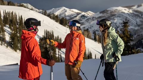 Three friends enjoying Ikon Pass First Tracks at Solitude Mountain Resort