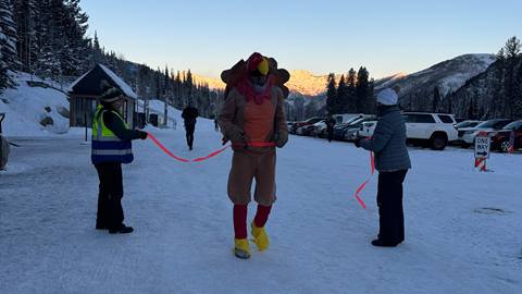 A person dressed as a turkey participates in Solitude Mountain Resorts Thanksgiving Turkey Trout