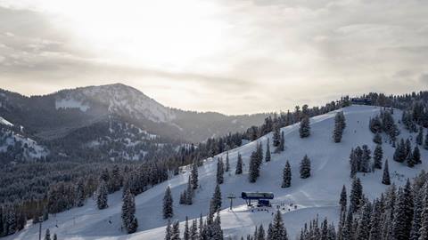 Moonbeam Express chairlift with spectacular sky at Solitude Mountain Resort