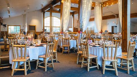 Indoor wedding venue in a rustic scenic lodge at Solitude Mountain Resort