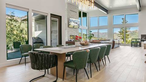 Dining room table with mountain views from Mountain Estates 5 Luxury Rental at Solitude Mountain Resort