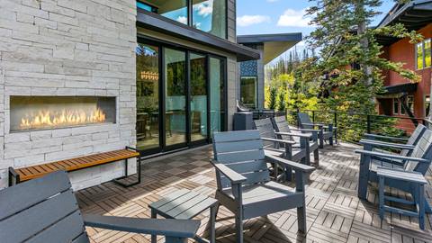 Outdoor fireplace with mountain view at Mountain Estates 5 Luxury Rental at Solitude Mountain Resort
