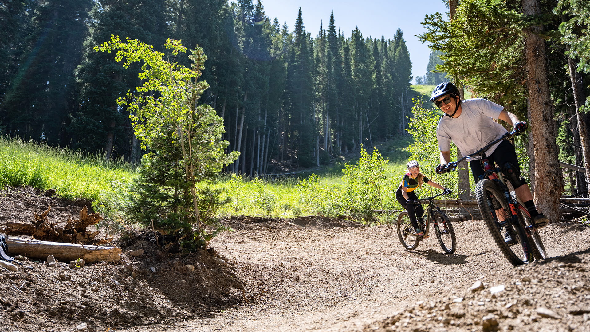 Two friends riding a green freeride trail at Solitude Bike Park