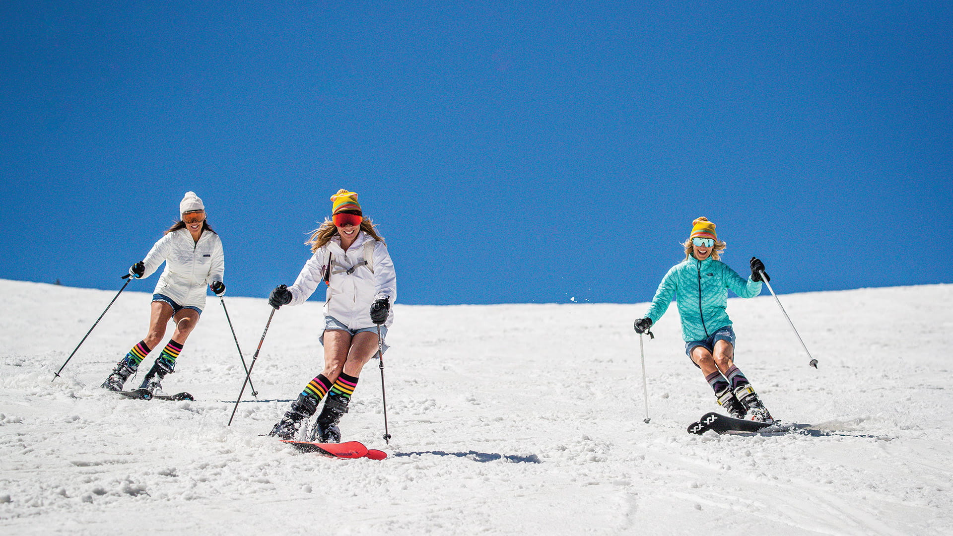 Three friends skiing at Solitude in the Spring