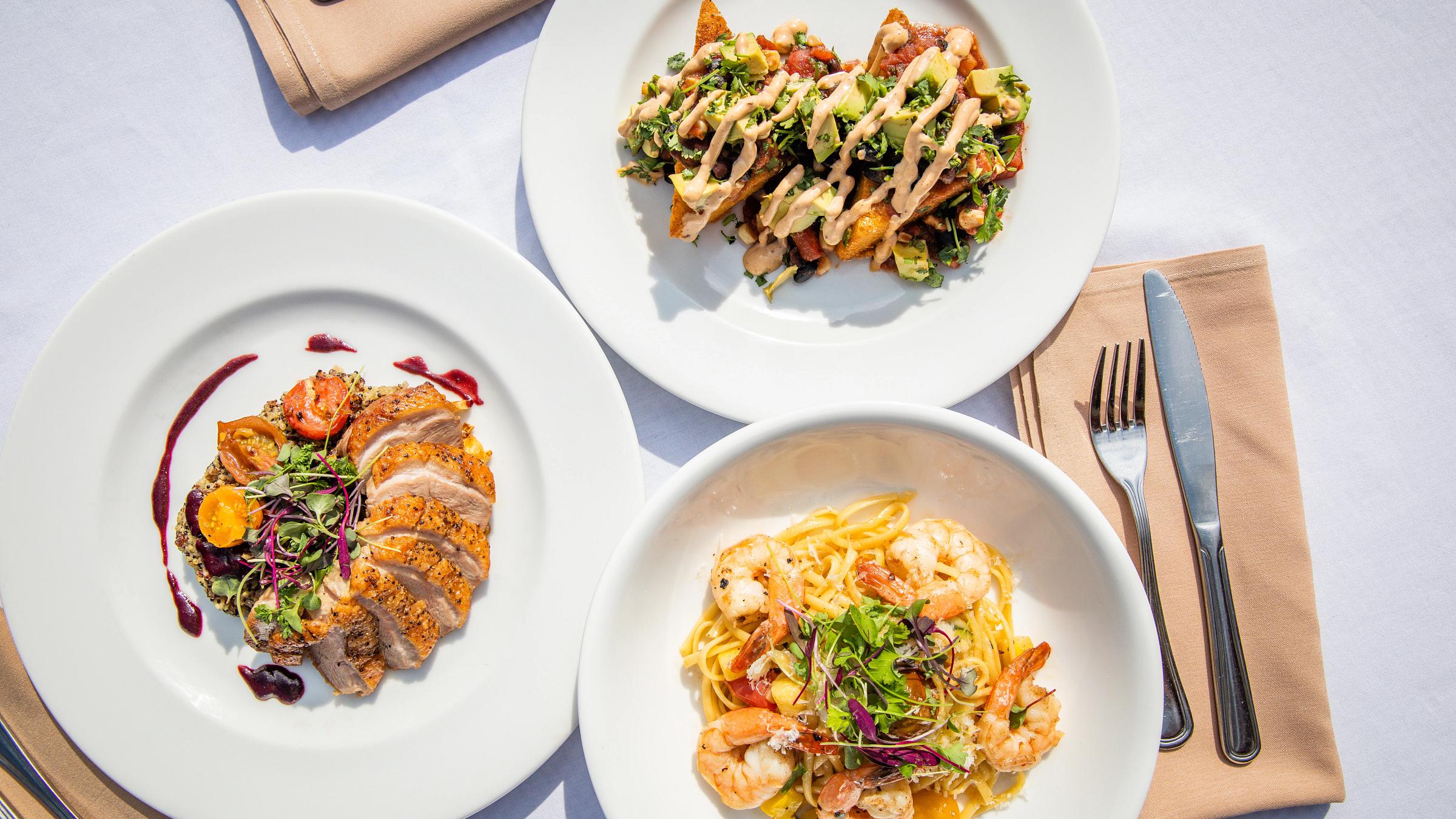 Duck breast, polenta cakes, and shrimp scampi linguini from Honeycomb Grill at Solitude Mountain Resort
