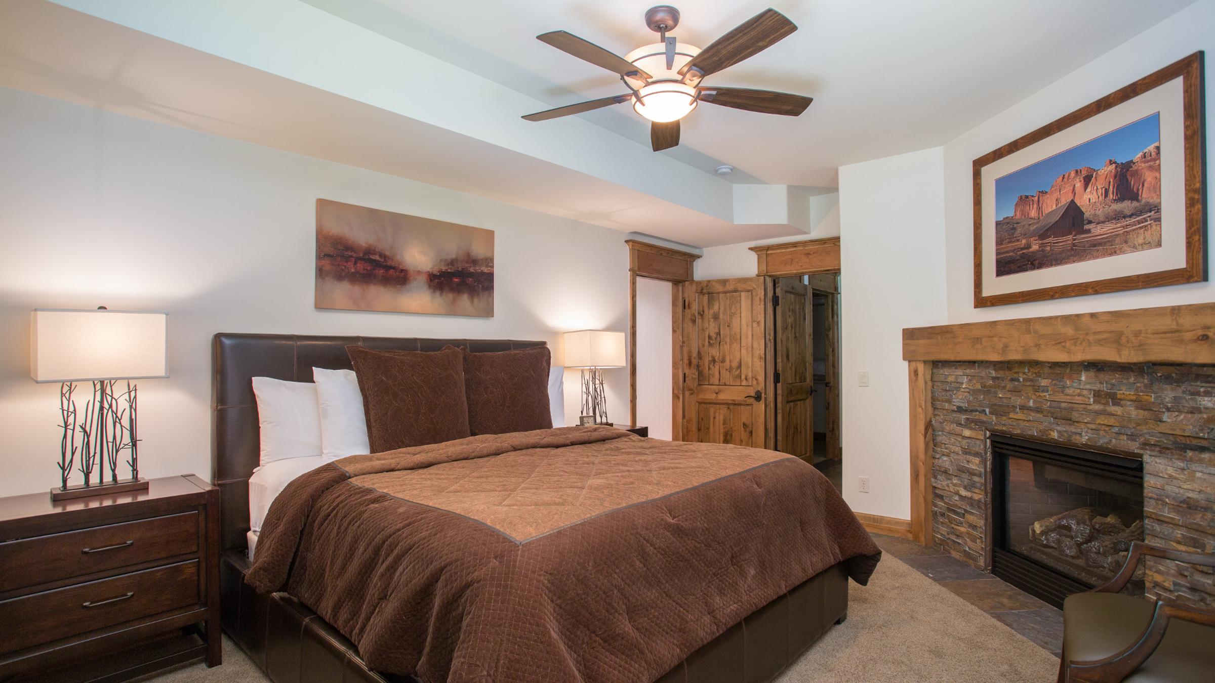 Bed with fireplace and side table