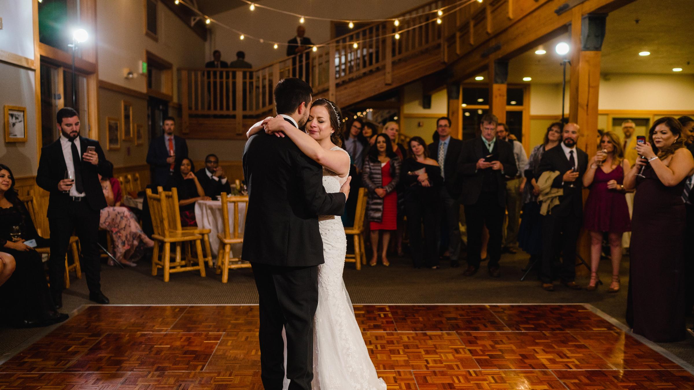 Bride and Groom First Dance inside Last chance Lodge