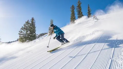 Skier enjoys groomer off of Powderhorn Lift