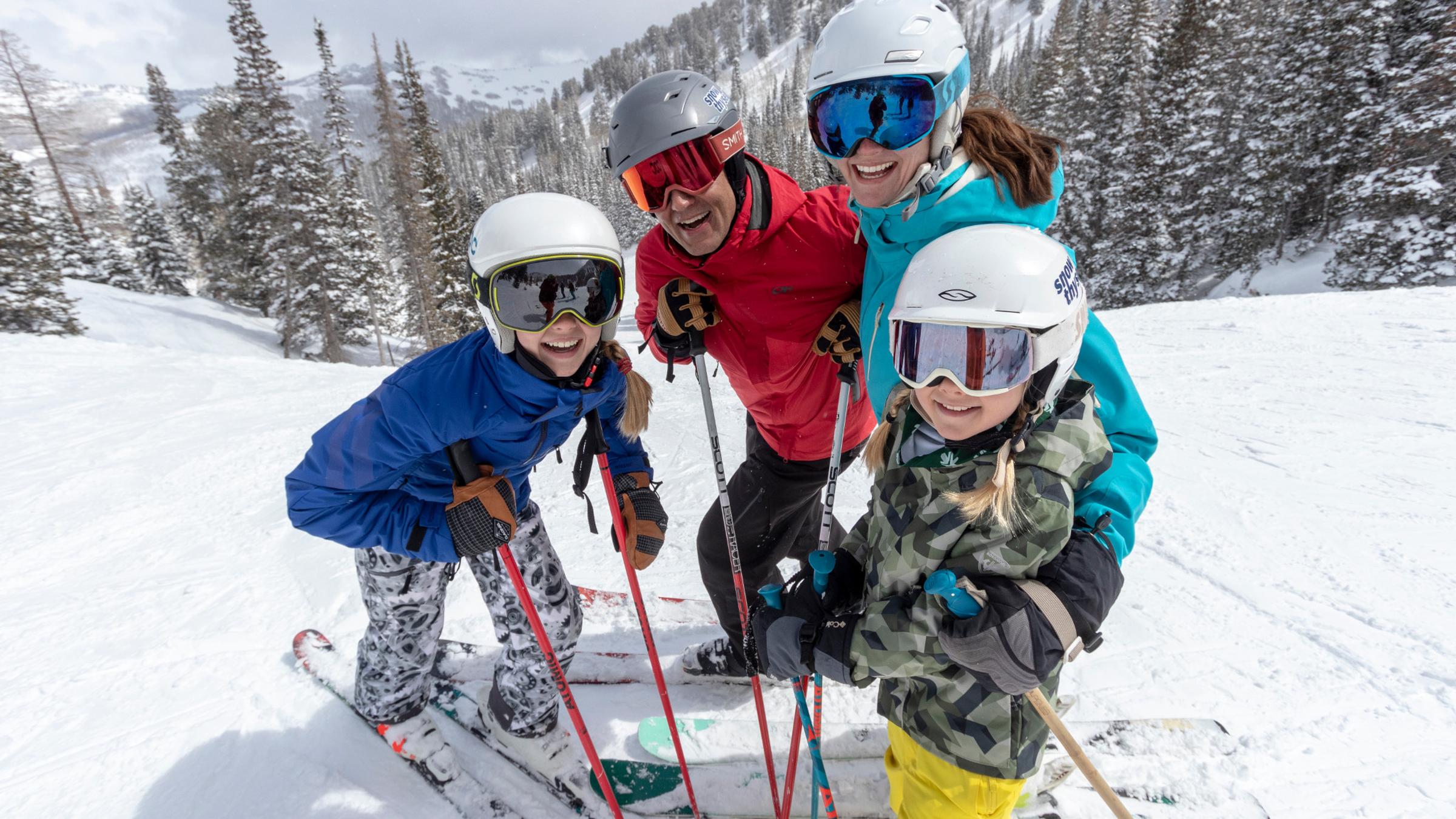 Family of four on the slopes at Solitude Mountain Resort