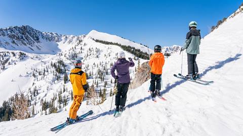 A family skiing together at Solitude Mountain Resort